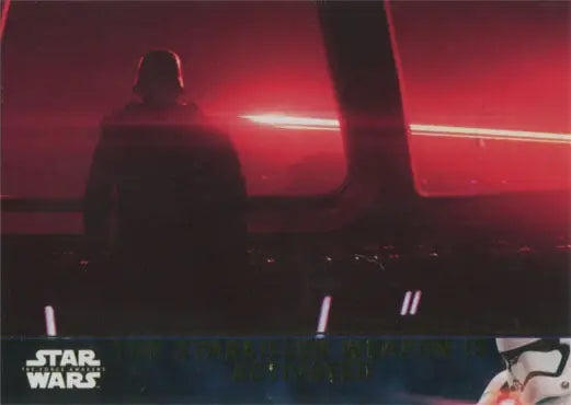 Silhouette of a hooded figure against a red sky in Star Wars Gold Parallel Trading Card