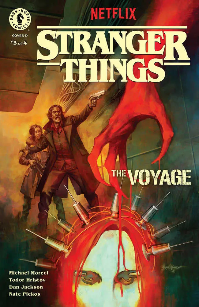 Stranger Things: The Voyage #3 cover features a glowing red lighthouse and trading cards