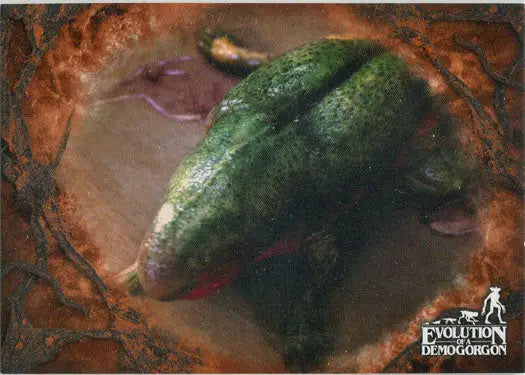 Green scaly reptilian head featured on Stranger Things Orange Parallel Chase Card EV-4