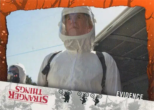 Person in protective suit with face shield by Stranger Things Orange Parallel Trading Card