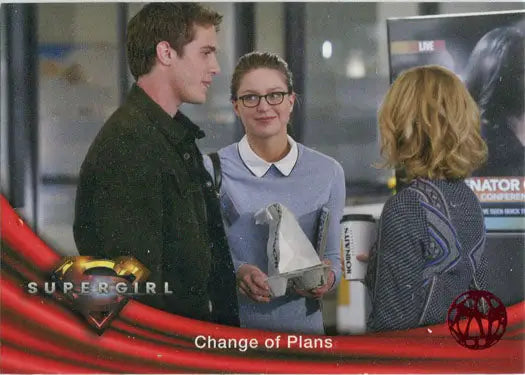 Trading card from Supergirl featuring characters and red omegahedron deco foil design