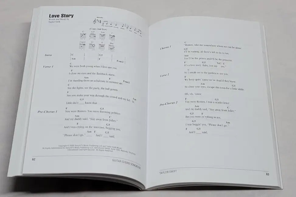 Open songbook featuring guitar chords from Taylor Swift Guitar Chord SongbookPaperback