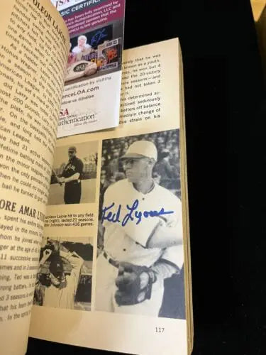 Autographed Ted Lyons baseball book from Hall of Fame Sports collection with trading cards