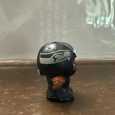 Seattle Seahawks Russell Wilson NFL figurine with football from TeenyMates Series 6