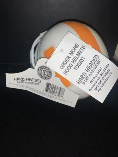 White and orange Tennessee Volunteers football helmet hood ornament from Hard Headed Sports