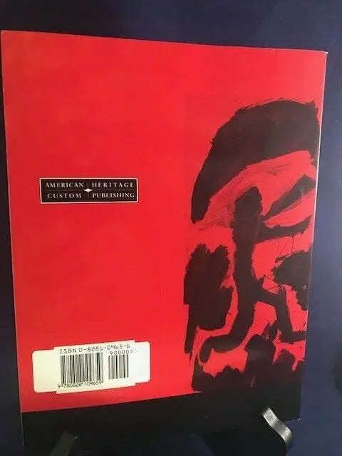 Red book with black abstract design about contemporary perspective on terrorism signed by author