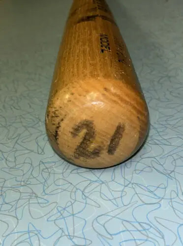 Wooden baseball bat used by Terry Puhl Houston Astros with number 21 on the end