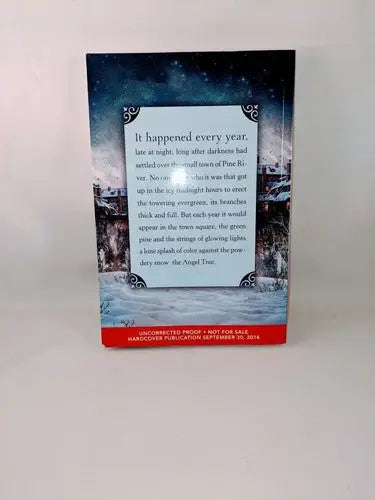 Book with winter scene and text from The Angel Tree by Daphne Benedis-Grab uncorrected proof