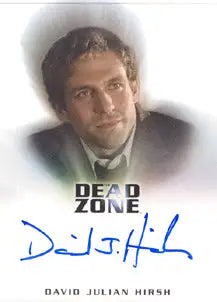 Headshot of David Julian Hirsh in a dark suit jacket on an autograph card