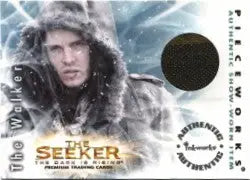 Promotional pieceworks costume card of The Seeker in winter attire with snowy backdrop