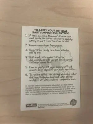 Bart Simpson tattoo instructions on The Simpsons Series 1 Otto Man trading card from 1993 Skybox Bongo