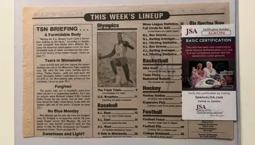 Newspaper clipping showing JSA certification for Tim Raines Expos HOF signed magazine