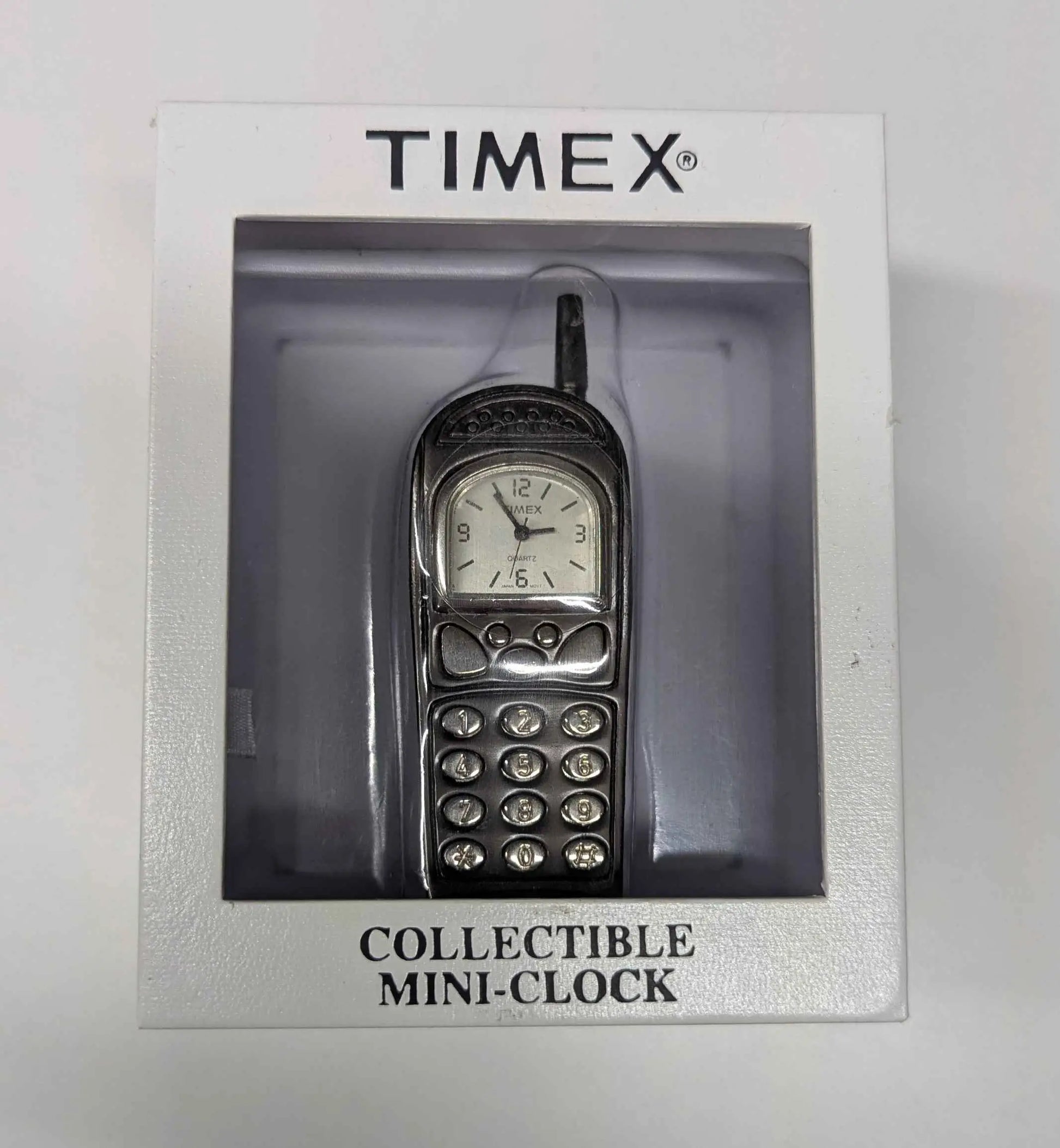Timex collectible mini-clock shaped like vintage cell phone for collectors and enthusiasts