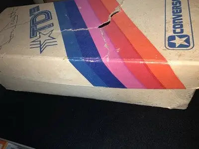 Damaged vintage Converse shoe box with colorful stripes for Tony Dorsett Converse football cleats