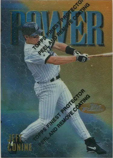 Baseball player in white pinstriped uniform swinging bat on Topps Finest Baseball card