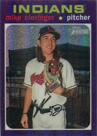 Cleveland Indians pitcher Mike Clevinger in a white uniform on a Purple Chrome Refractor card