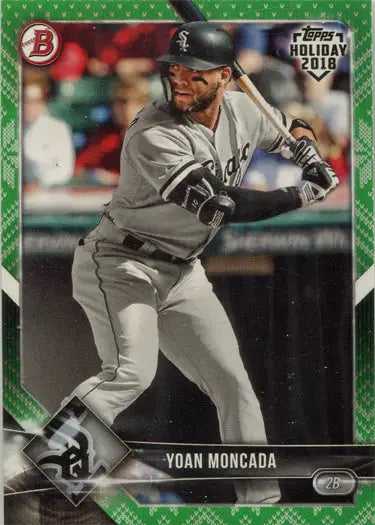 Baseball card of Yoan Moncada at bat in Topps Holiday 2018 Green Border Parallel design