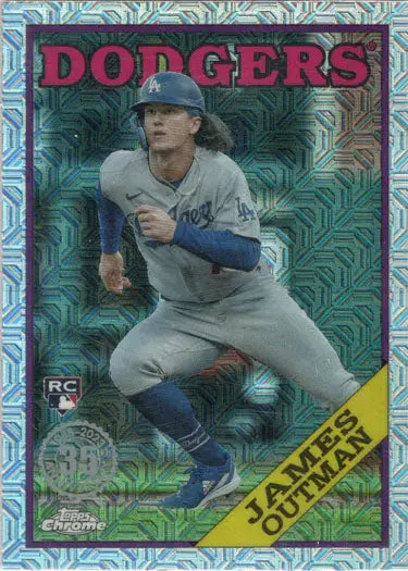 Baseball card of Dodgers pitcher James Outman in throw on chrome silver background