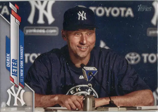 Baseball player in New York Yankees cap at press conference for Topps short print card