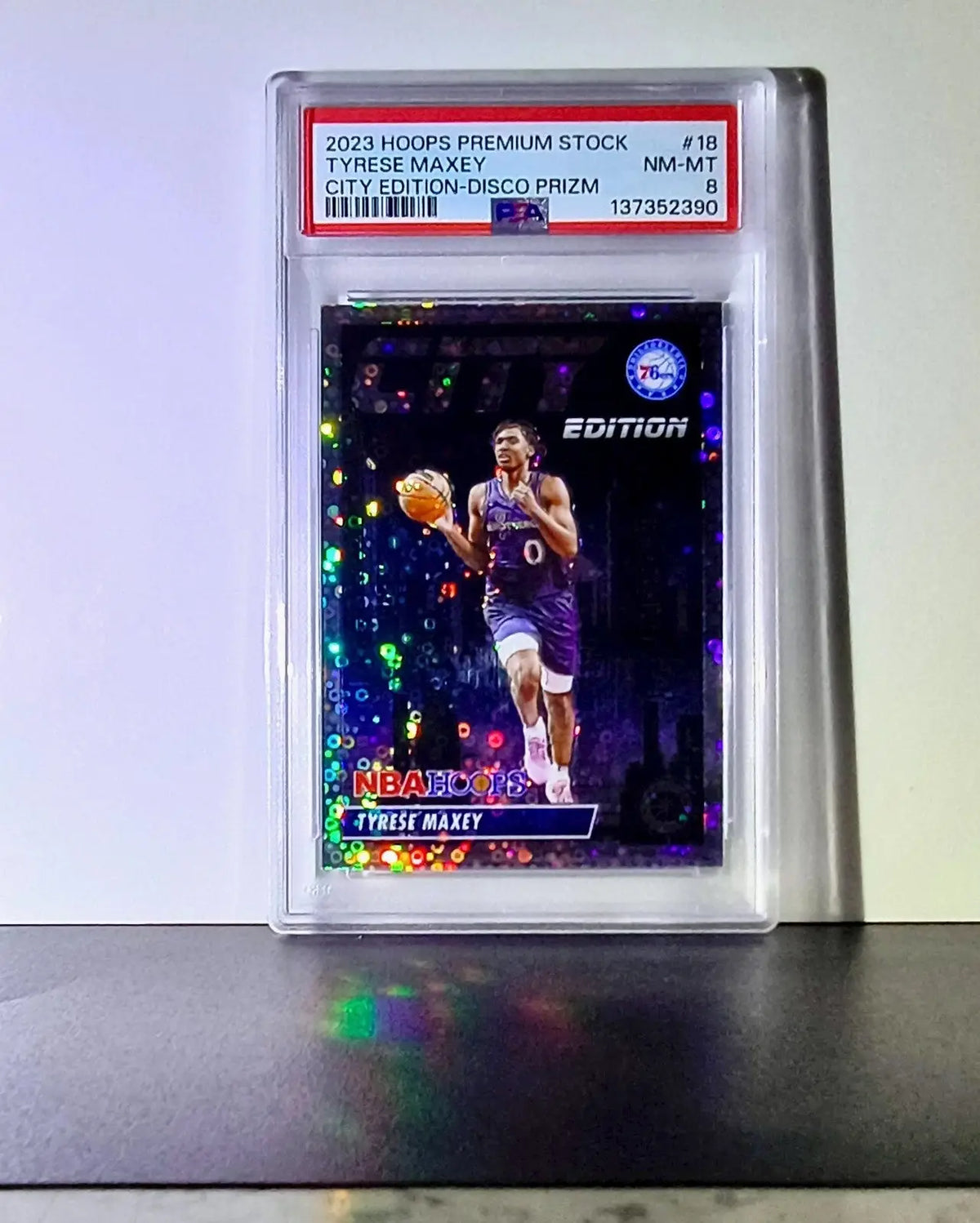 Tyrese Maxey 2023 NBA Panini Hoops Premium #18 City Edition Disco Prizm PSA 8 - Basketball Card Single