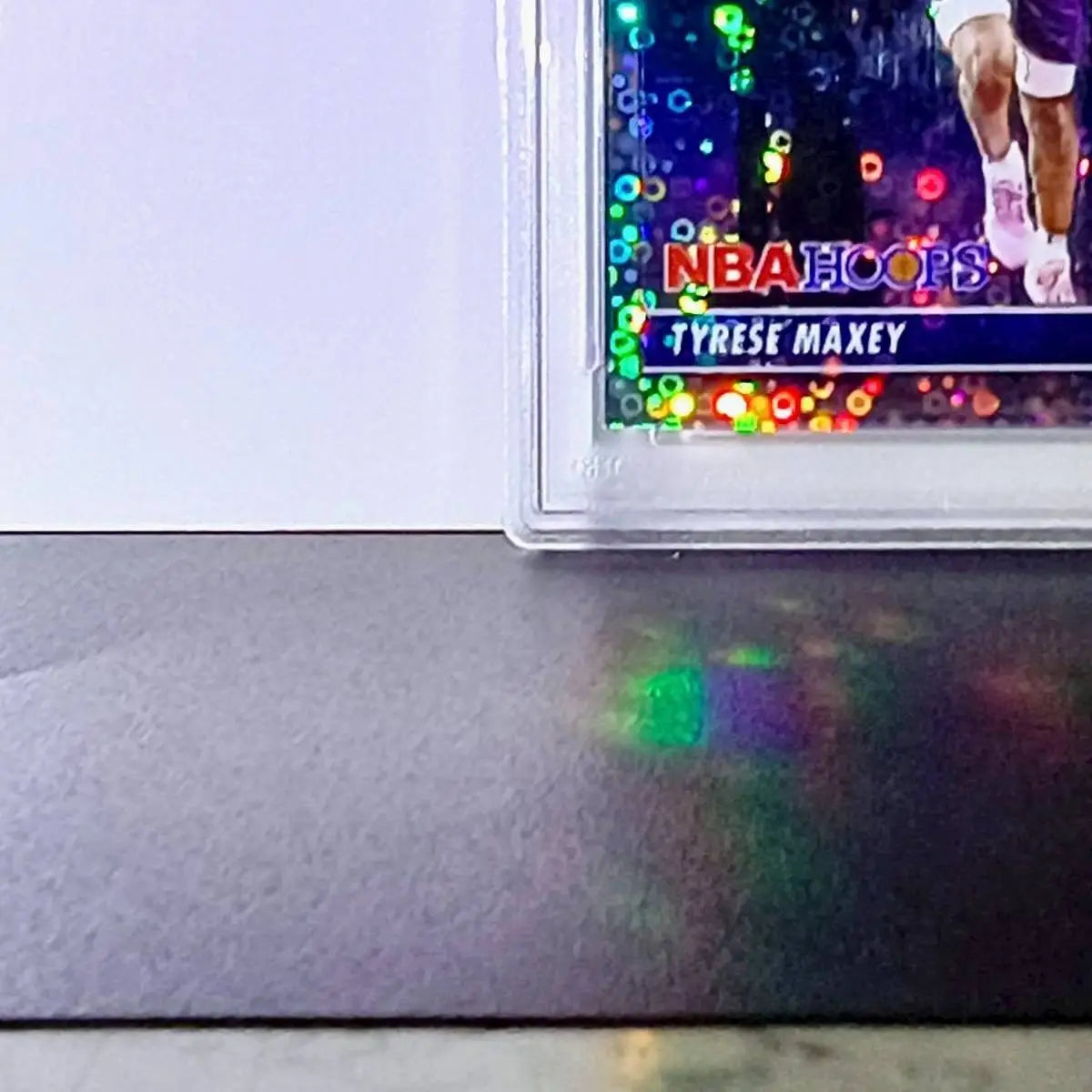 Tyrese Maxey 2023 NBA Panini Hoops Premium #18 City Edition Disco Prizm PSA 8 - Basketball Card Single