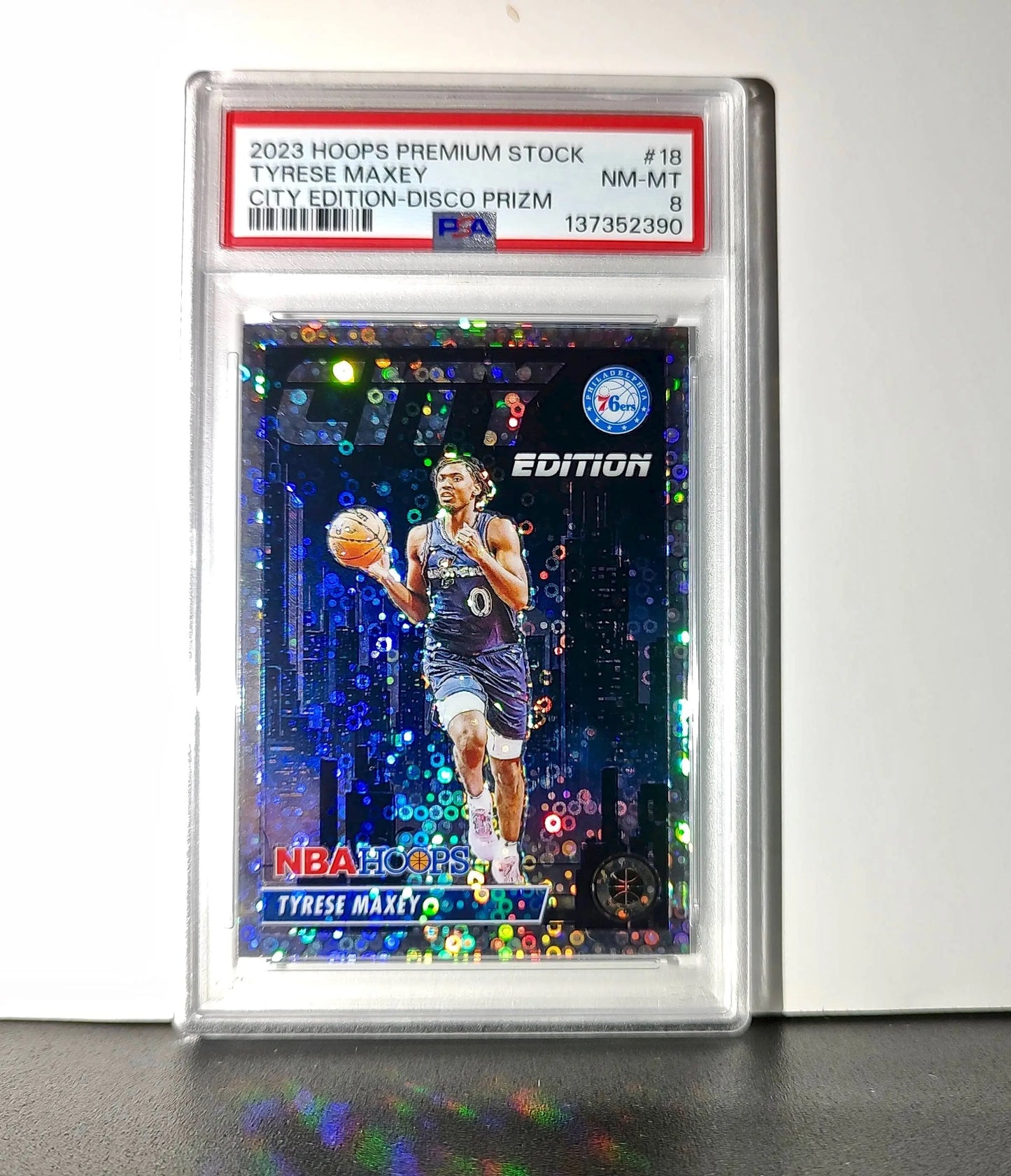 Tyrese Maxey 2023 Panini Hoops Premium City Edition #18 Disco Prizm PSA 8 NM-MT
