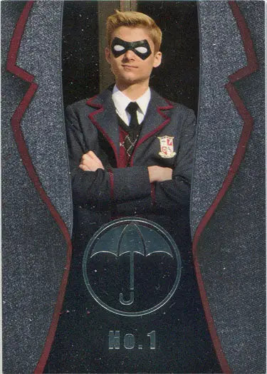 Costumed figure in black eye mask and red trim from Umbrella Academy Chase Card TN1