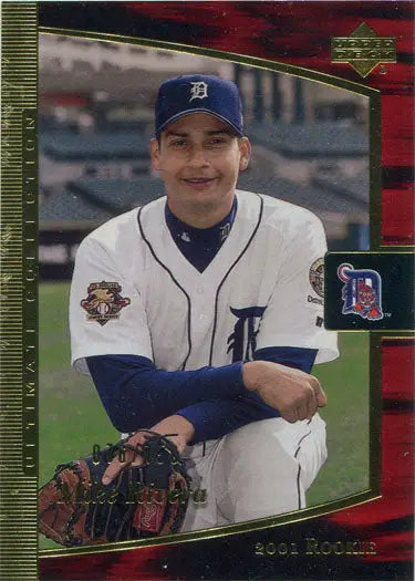 Base rookie card featuring smiling Baseball player in Detroit Tigers uniform and cap