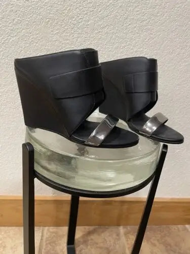 Black wedge sandals with silver straps for edgy sophistication in Vince women’s high heel wedge