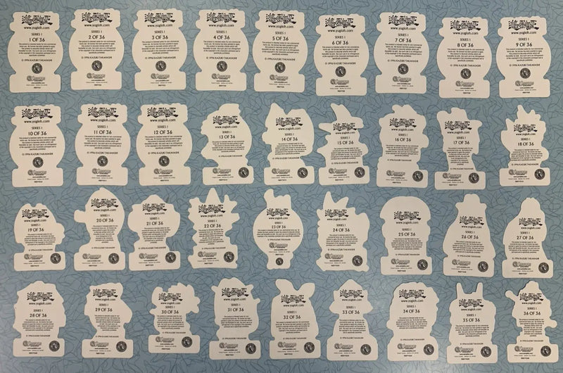 Collection of die-cut paper tags from Vintage 1996 Yu-Gi-Oh Vending Sandy Lion Holographic Sticker Set