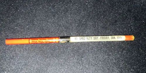 Orange and white promotional pencil for Vintage Medicine Pharmacy advertising medical tablets