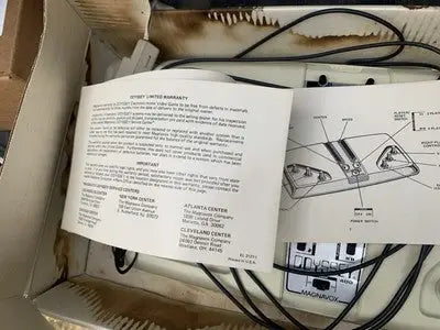 Vintage Magnavox Odyssey 400 home video game console with warranty for classic gaming