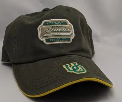 Olive green vtg American Needle Oregon Ducks cap with yellow brim trim and logo