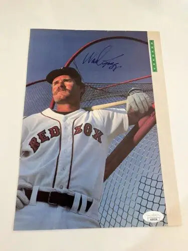 Autographed Wade Boggs magazine page featuring Boston Red Sox baseball picture