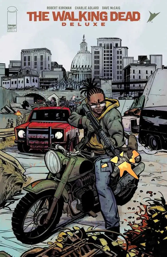 Comic book cover of The Walking Dead Deluxe #69 featuring motorcycle city scene, ideal for collectors