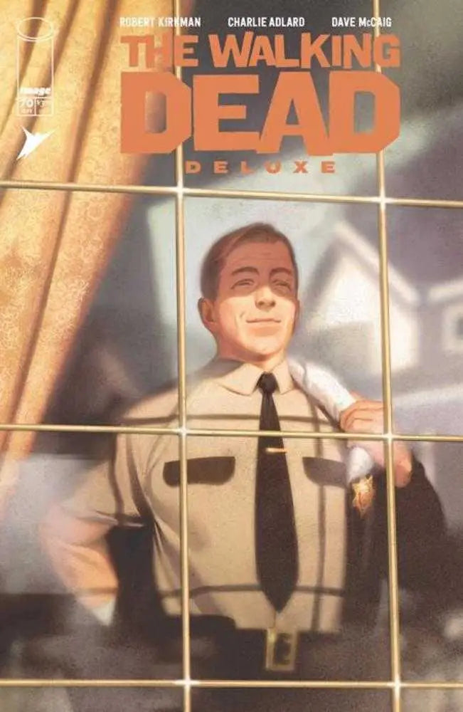 Comic book cover of The Walking Dead Deluxe #70 with sheriff figure, perfect for trading cards