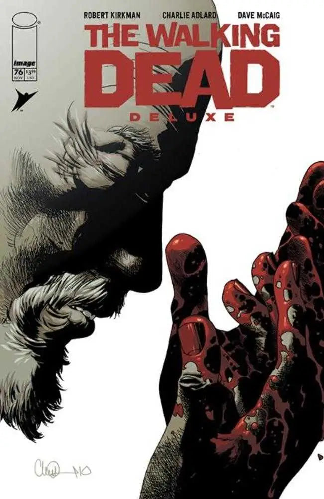 Comic book cover of Walking Dead Deluxe #76 with zombie hands and silhouette, ideal for trading cards