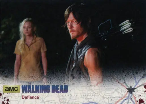 Two characters from The Walking Dead in a dark outdoor setting on silver parallel trading card