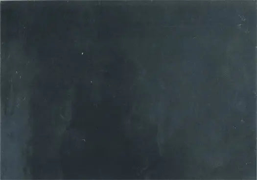 Dark textured slate surface enhancing the Walking Dead Reunion Chase Card Z1 Foil design