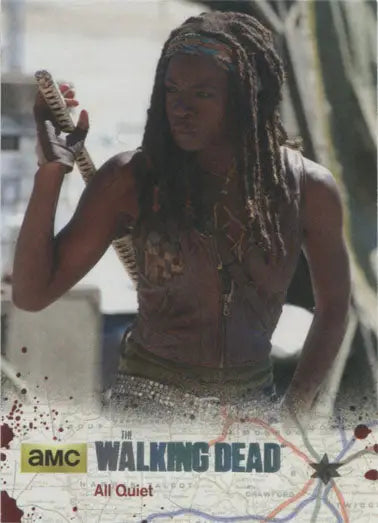 Character from The Walking Dead with a sword on a silver foil parallel card