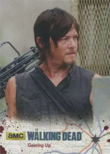 Man with long dark hair in sleeveless black shirt for Walking Dead Silver Foil Parallel