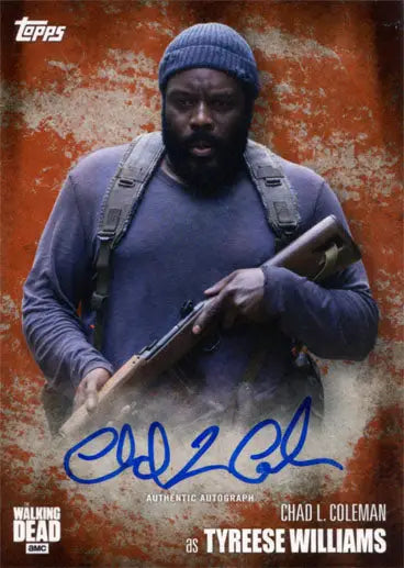 Trading card of Tyreese Williams in blue hat and sweater holding a rifle