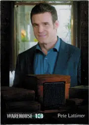 Man in navy suit jacket smiling, representing Pete Lattimer trading cards from Warehouse 13