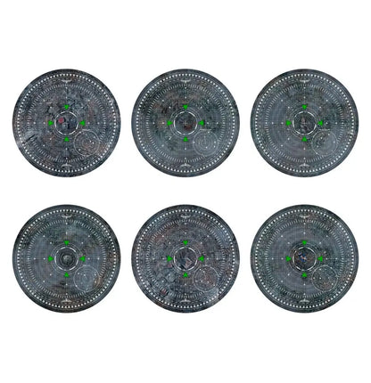 Six circular patterned navigational instruments from Warhammer 40k Objective Set