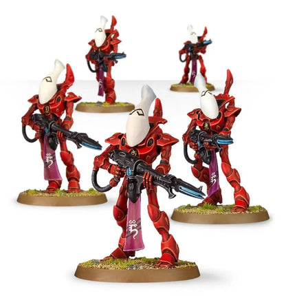 Red and white Eldar Guardian miniatures with rifles on textured bases for Warhammer Aeldari Wraithguard