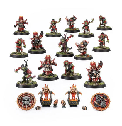 Painted Chaos Dwarf warriors and tokens in red and metallic for Blood Bowl team