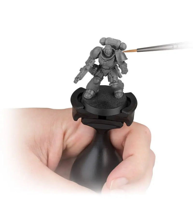 Miniature painting handle with figure from Warhammer Citadel Colour for hobbyists