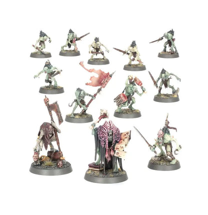 Painted miniature fantasy figures from Warhammer Flesh-Eater Courts boxed set builds featuring ghoul-like creatures and a robed leader for grand justice gormayne