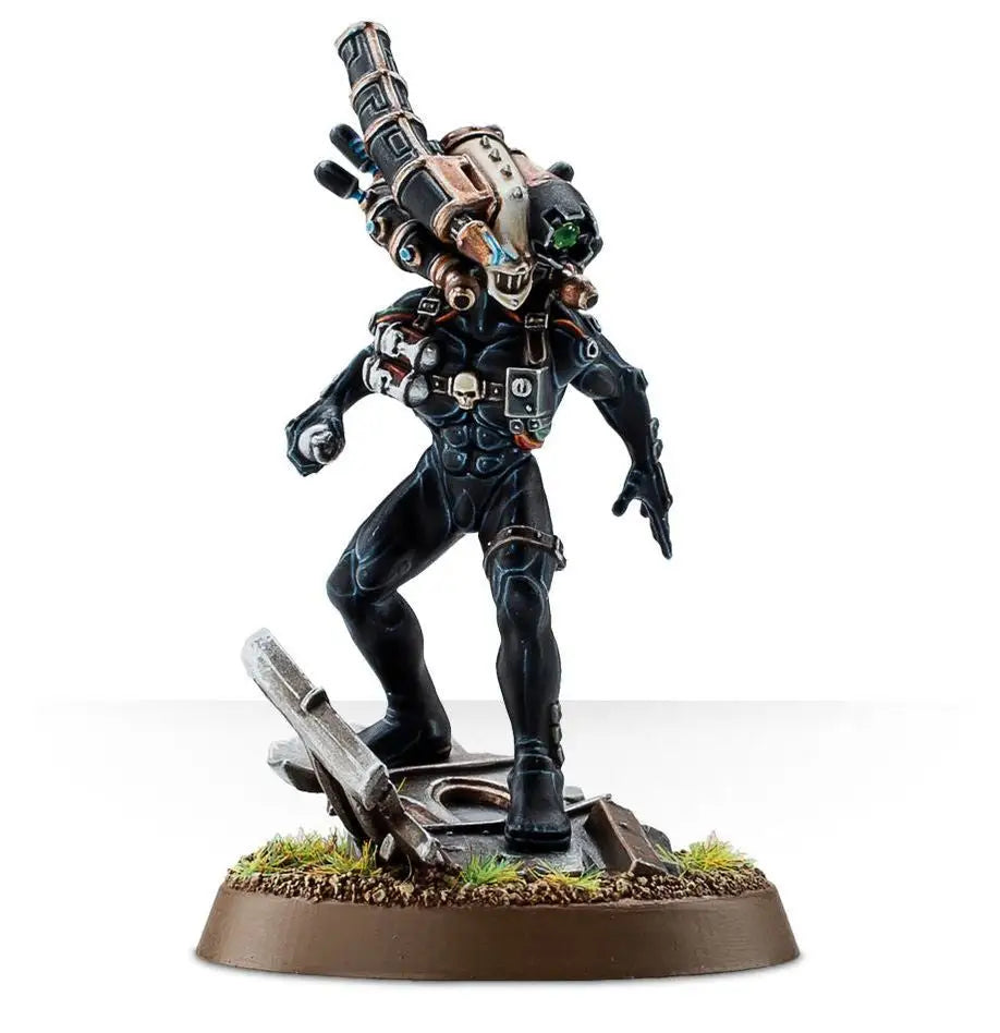 Painted Culexus Assassin miniature with animus speculum in black armor and weapon system