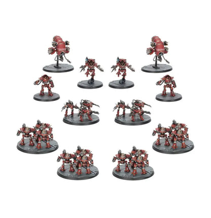 Collection of red metallic robotic figures on round bases from Warhammer Legions Imperialis